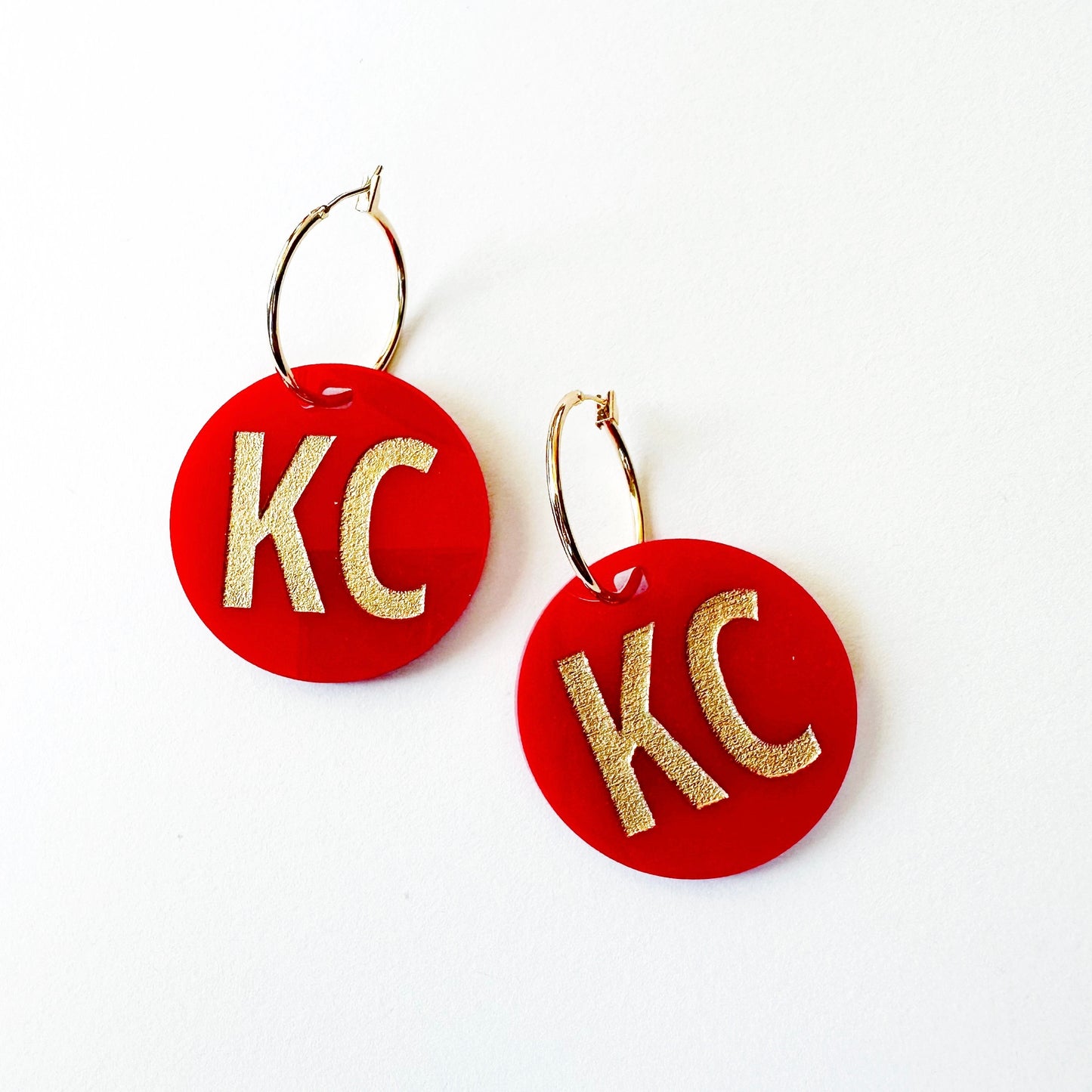 KC Red and gold circles