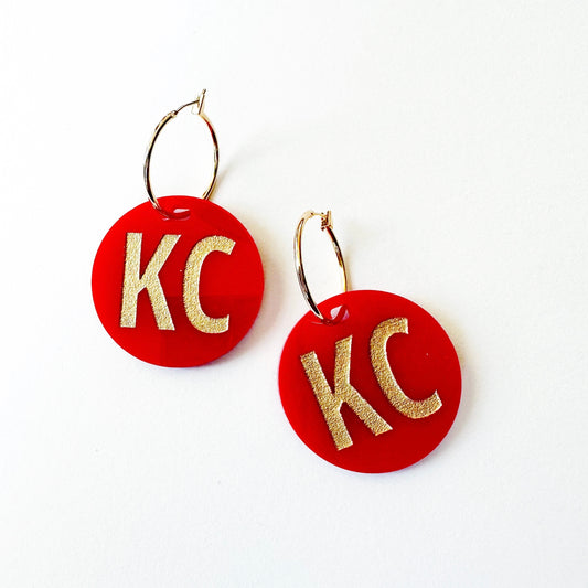 KC Red and gold circles